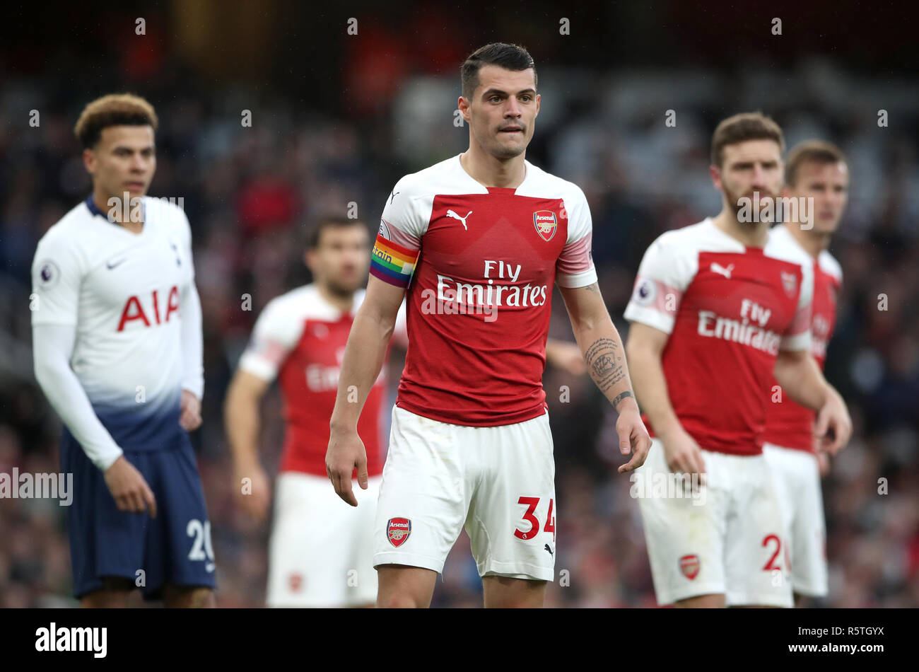 Arsenal's Granit Xhaka wears a rainbow captain's armband during the Premier League match at Emirates Stadium, London. Stock Photo