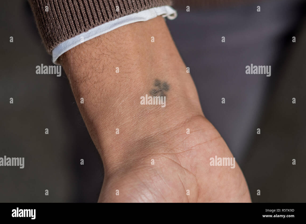 Tattooed Coptic cross on a wrist, Aswan, Egypt Stock Photo