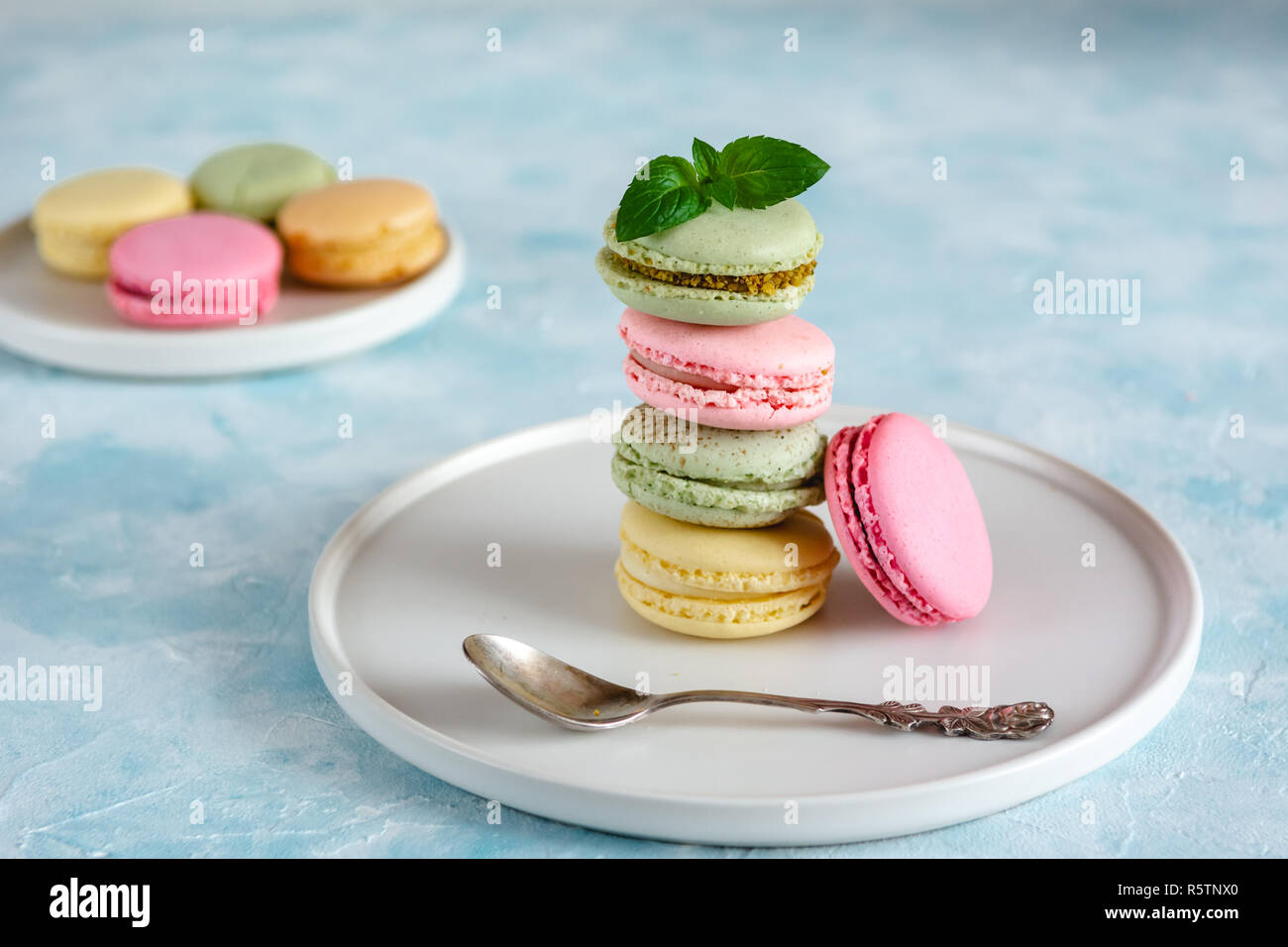 Colorful macarons cakes. Small French cakes. Sweet and colorful french macaroons. Stock Photo