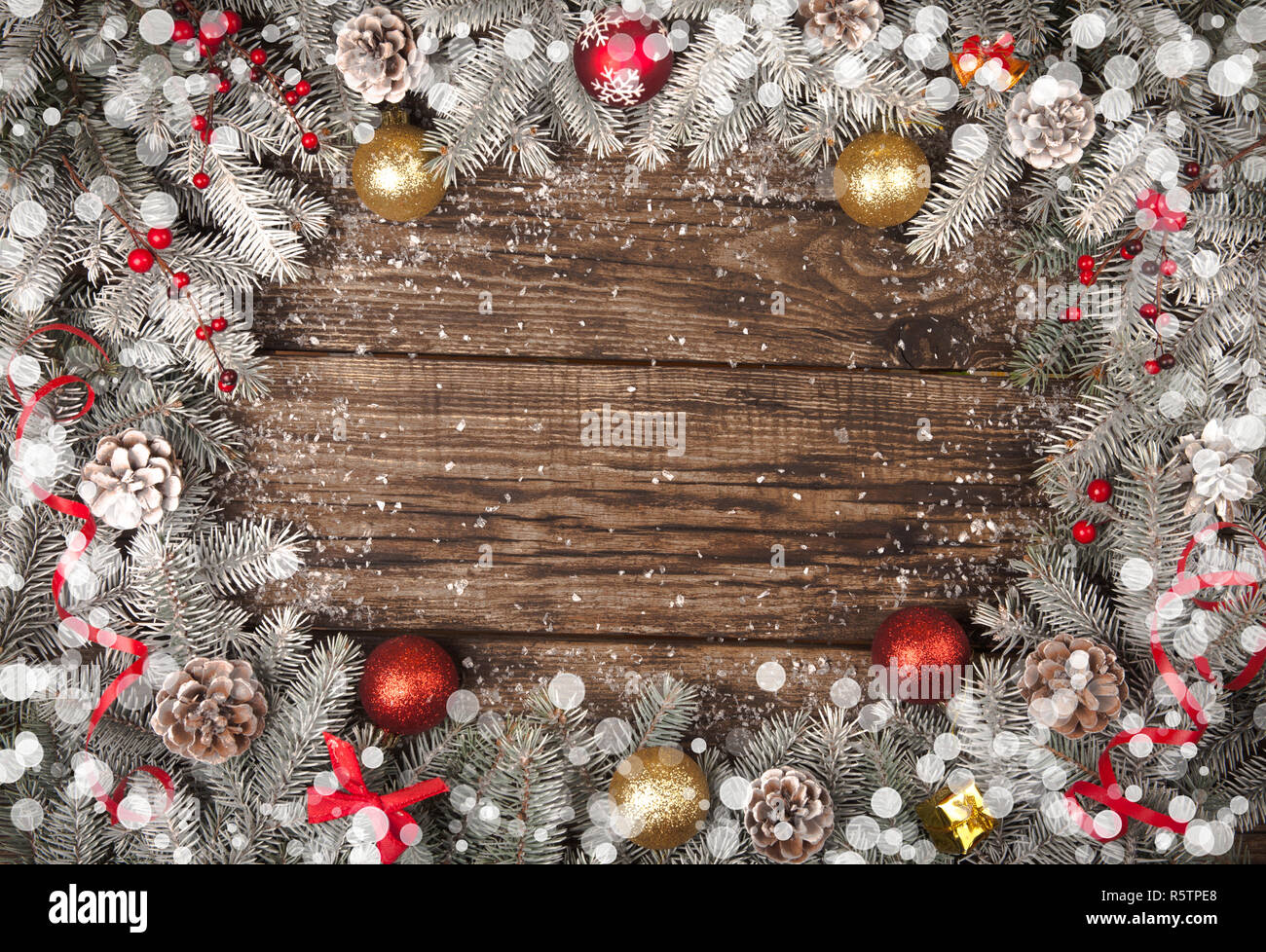 Christmas grunge wooden background with snow fir tree. Top view with ...