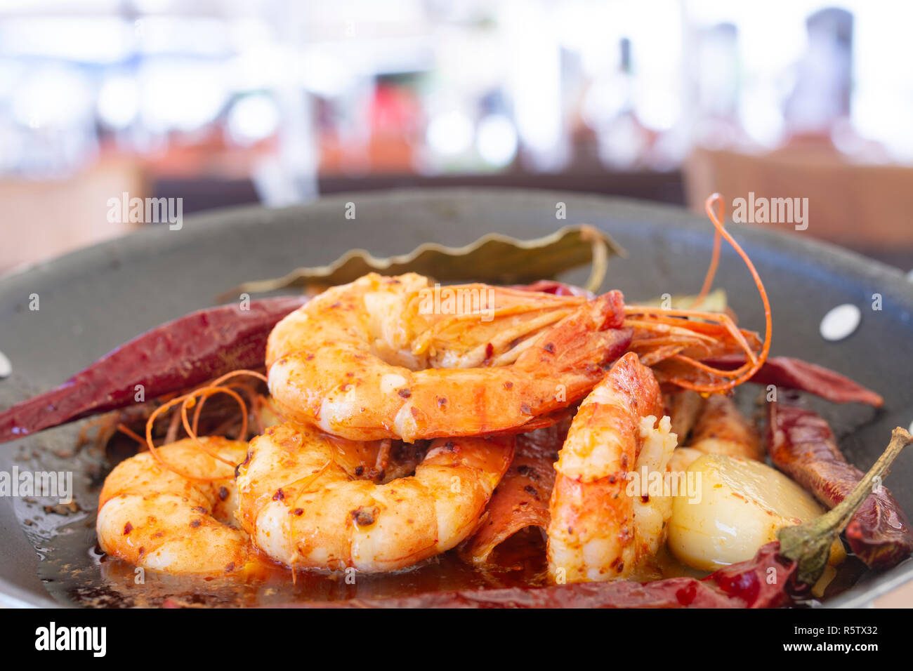 Delicious jumbo prawns with red peppers and butter garlic sauce Stock