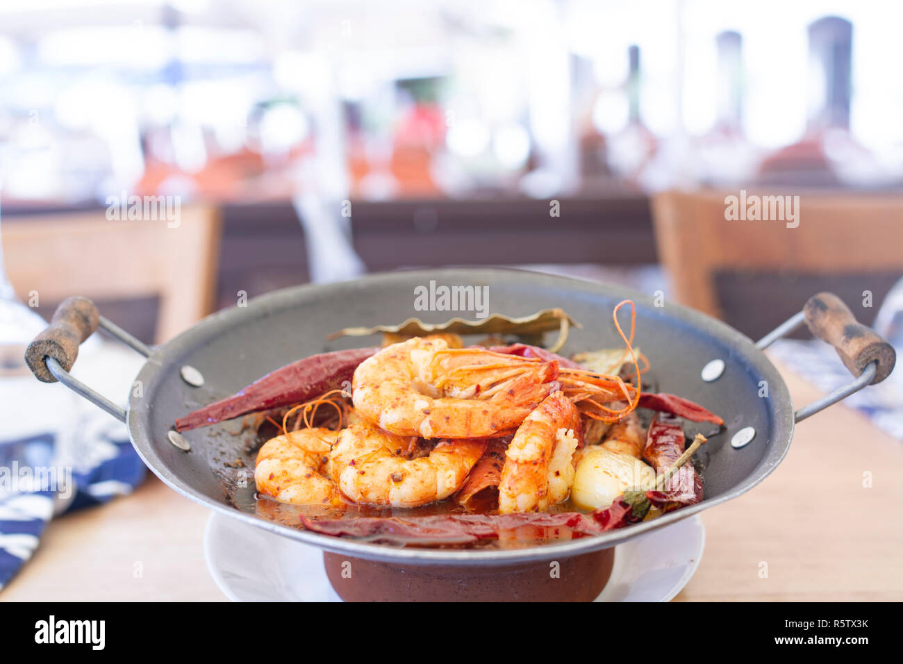 Delicious jumbo prawns with red peppers and butter garlic sauce Stock