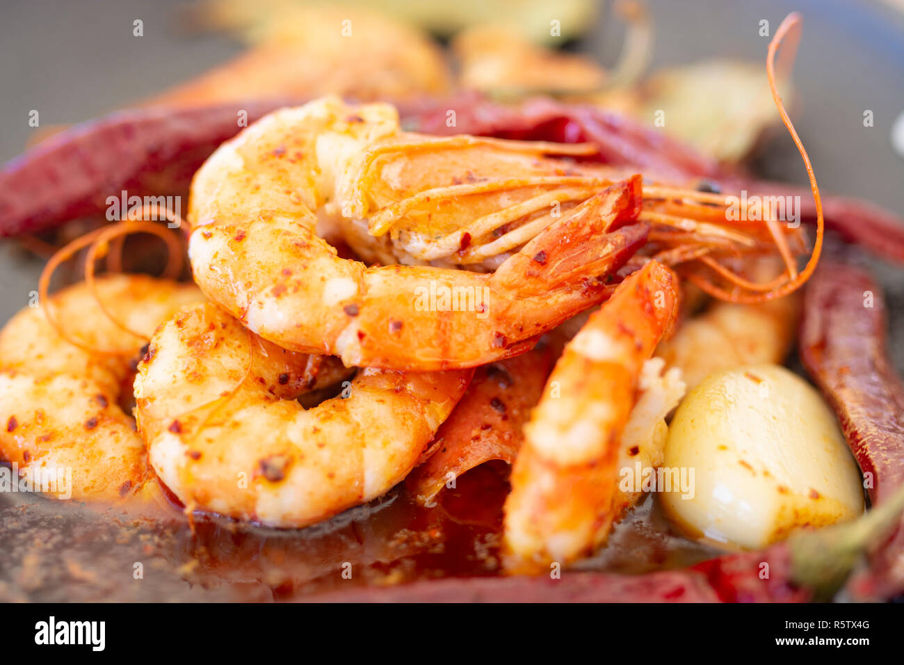 Delicious jumbo prawns with red peppers and butter garlic sauce Stock