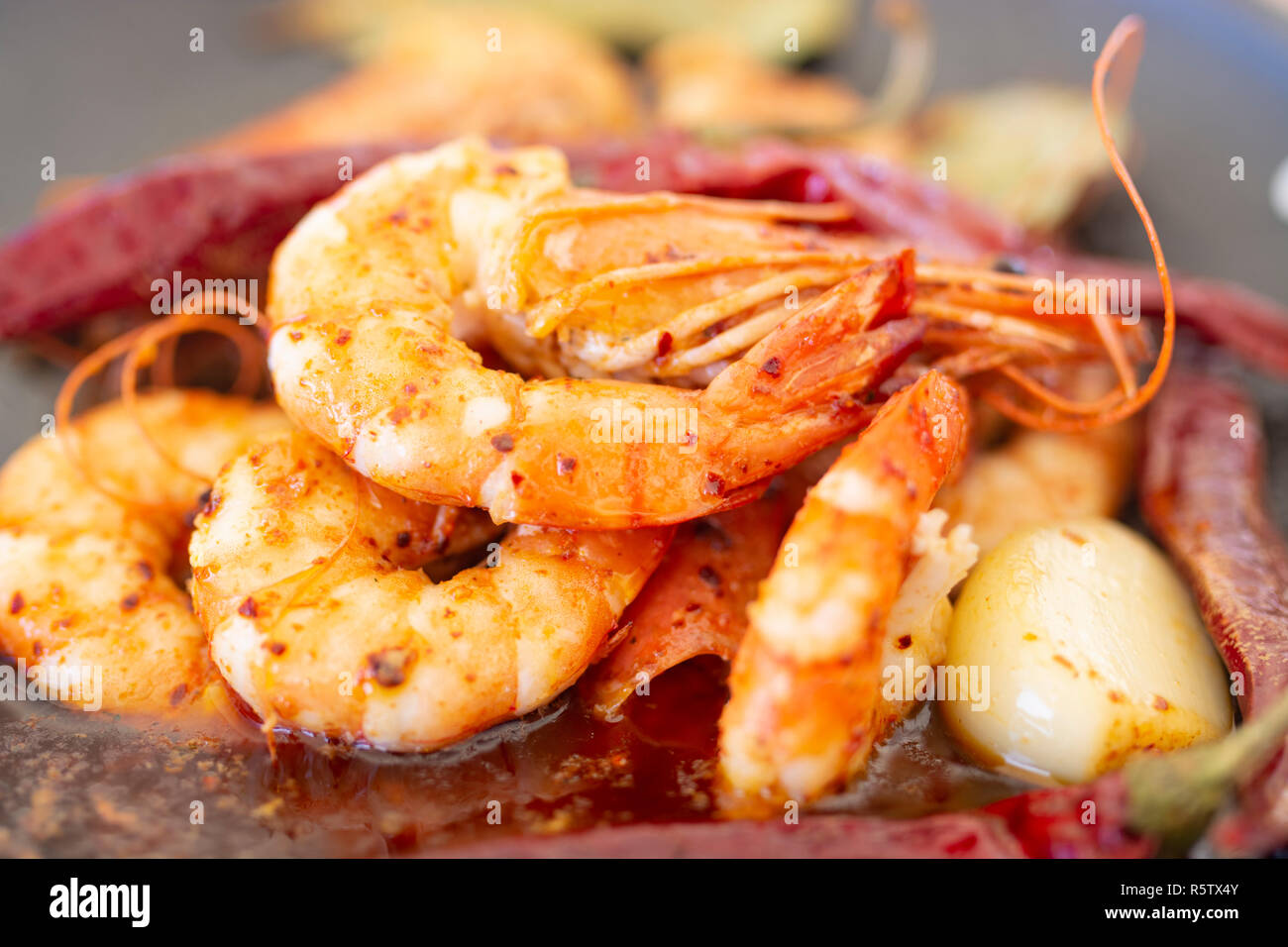 Delicious jumbo prawns with red peppers and butter garlic sauce Stock