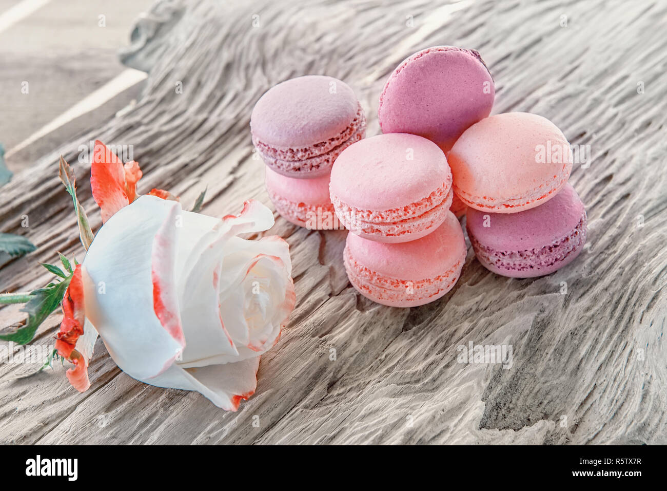 Freshly baked multi-colored macaroons close-up, selective focus. Stock Photo