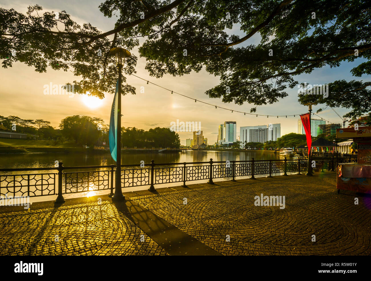 Kuching Waterfront along the Sarawak river during sunrise. Stock Photo