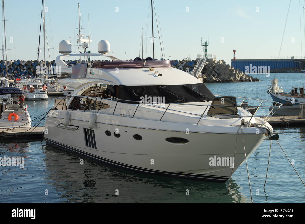 Sea yacht are at the pier in the southern port. Stock Photo