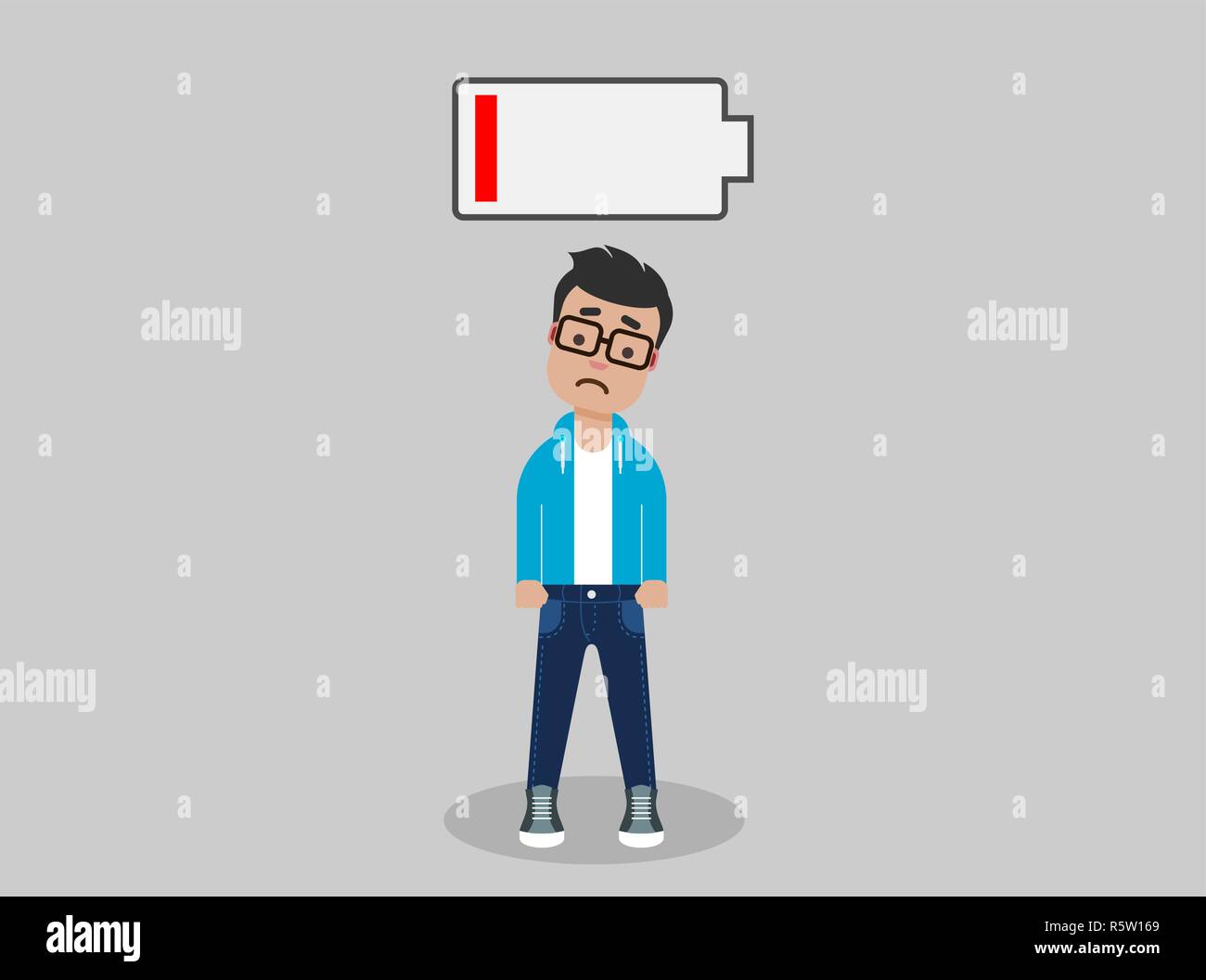 Tired young man standing below the low battery symbol. Low energy