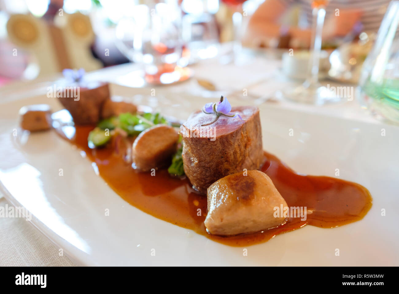 pork fillet with gnocchi and sauce in the restaurant Stock Photo Alamy