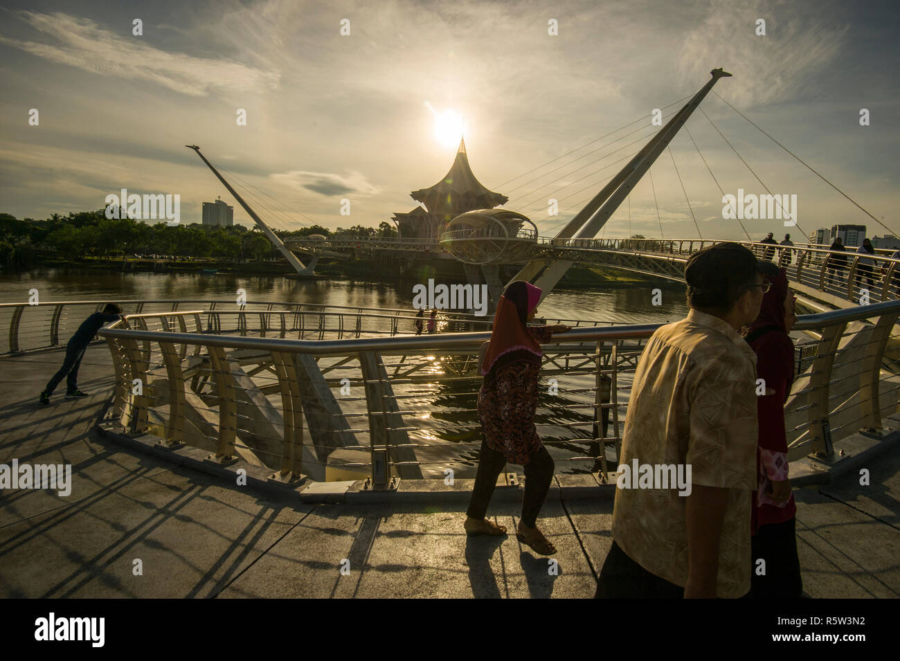 The Darul Hana Bridge in Kuching is the only pedestrian bridge that connects the North and South of Kuching at the moment. Stock Photo