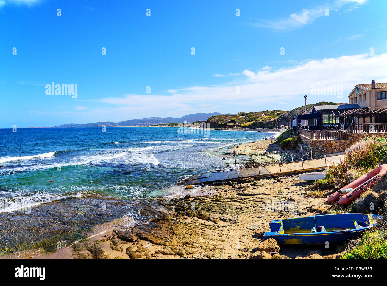 beach la ciaccia spiaggia la ciaccia sardinia rock boat Stock Photo - Alamy