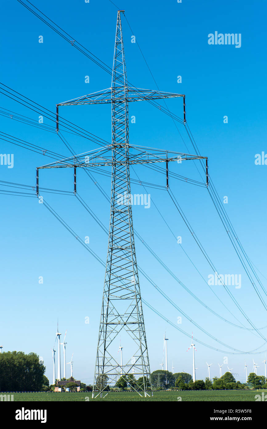 electricity pylon and transmission lines in germany Stock Photo