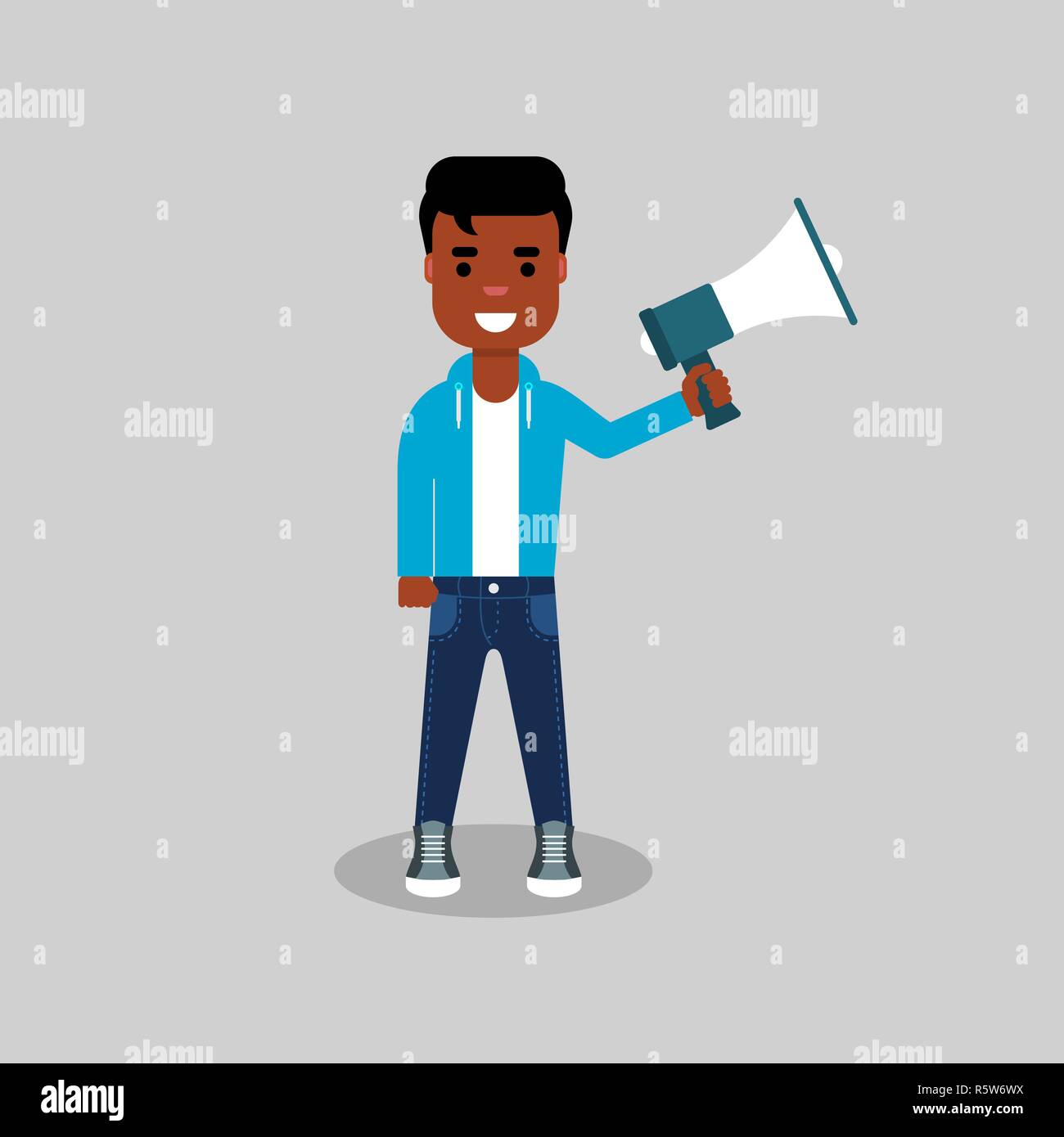 Young African American standing with a megaphone in his hand. Stock ...