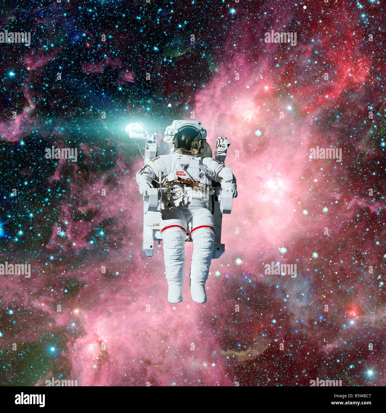 Astronaut in outer space. Nebula and stars on the background Stock Photo -  Alamy