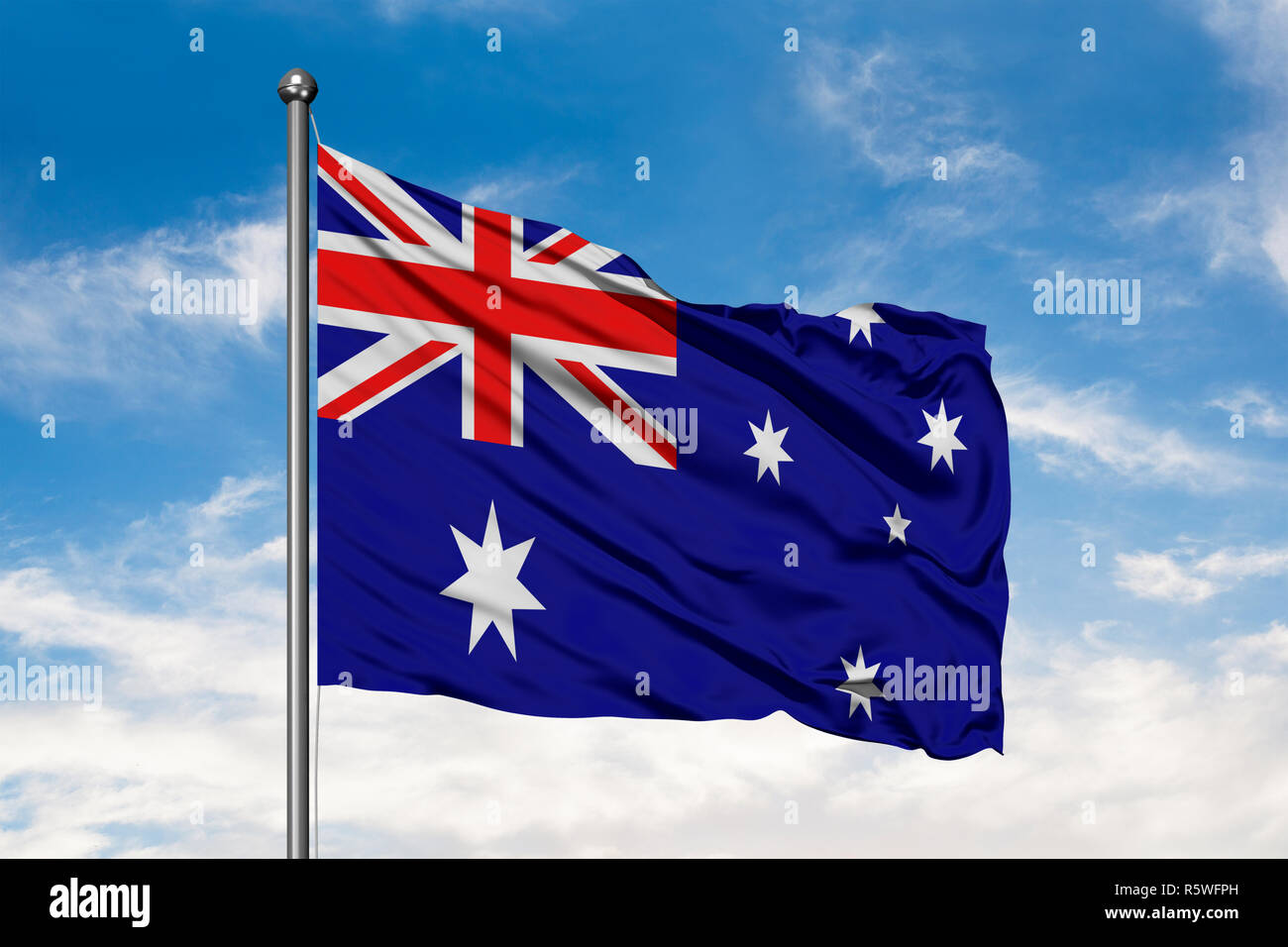 Flag of Australia waving the white cloudy blue sky. Australian flag Photo - Alamy