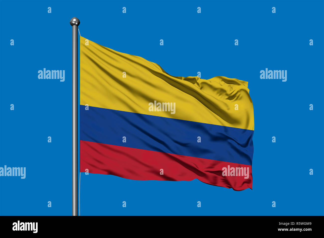 Flag Of Colombia Waving In The Wind Against Deep Blue Sky - 