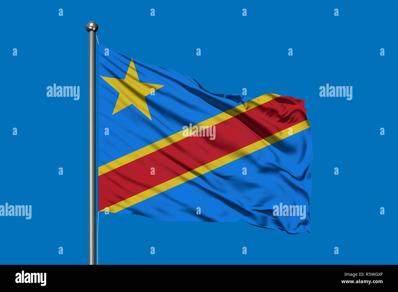 Flag of Congo waving in the wind against deep blue sky. Congolese flag ...