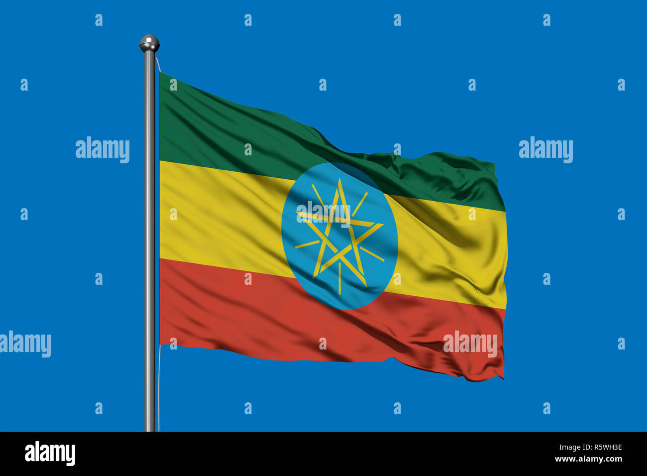 Flag Of Ethiopia Waving In The Wind Against Deep Blue Sky Ethiopian Flag Stock Photo Alamy