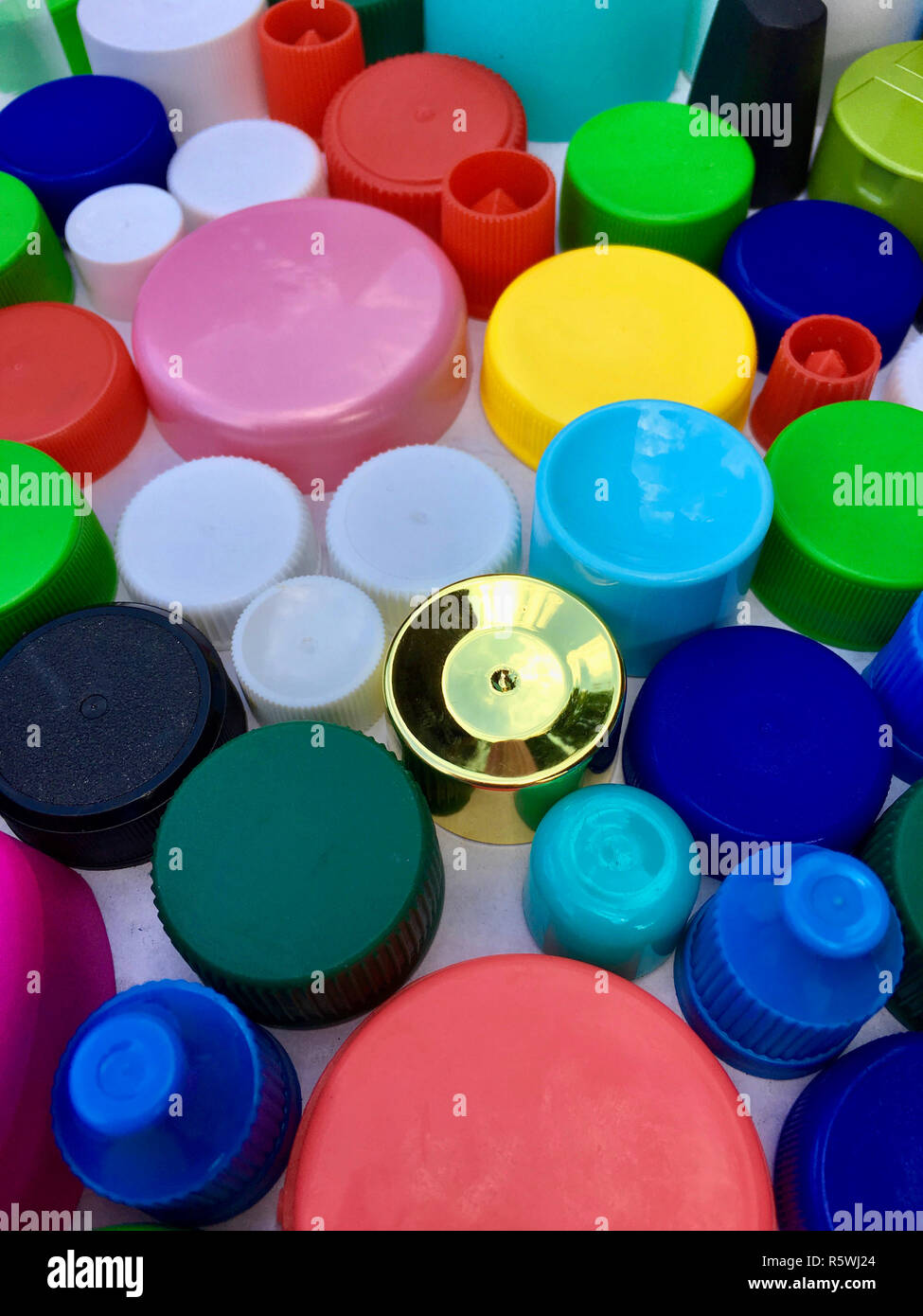 used plastic lids,recycled material Stock Photo Alamy