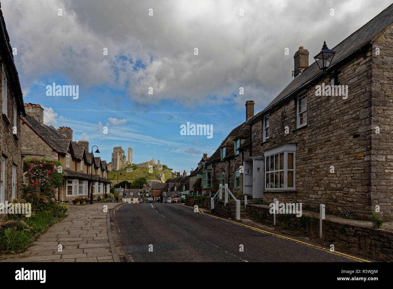 The main road going through Corfe Castle Village on a quiet day Stock Photo
