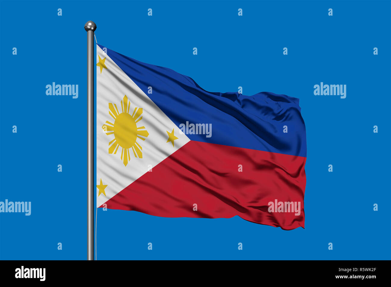 Flag of Philippines waving in the wind against deep blue sky ...