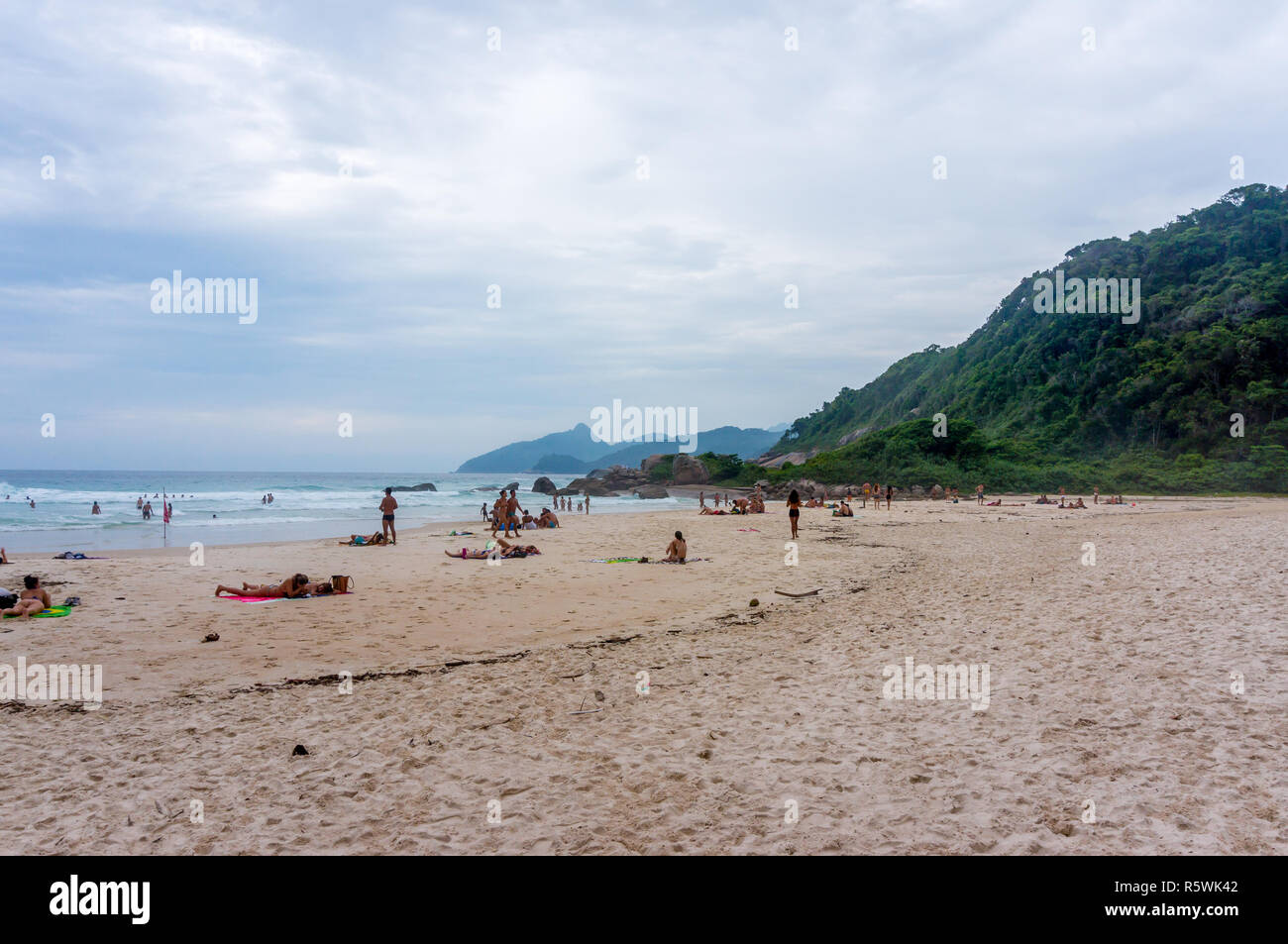 People sunbathing on Lopes Mendes Beach, Ilha Grande, Brazil Stock Photo