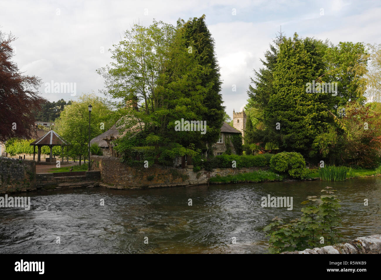 Riverside cottage, Ashford in the water in the Peak District National Park Derbyshire England UK