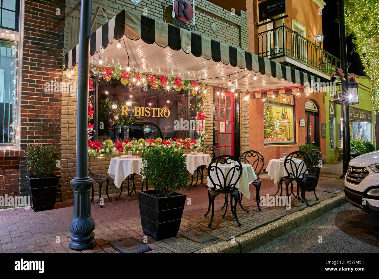 R Bistro upscale boutique restaurant front exterior entrance at night in Fairhope Alabama, USA. Stock Photo