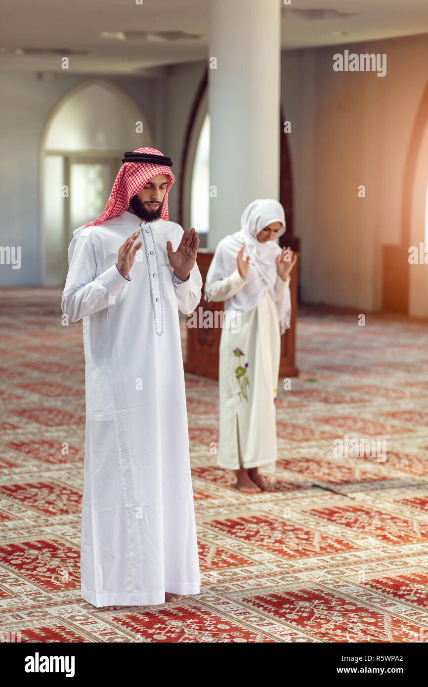 Muslim Praying man and woman in mosque Stock Photo Alamy