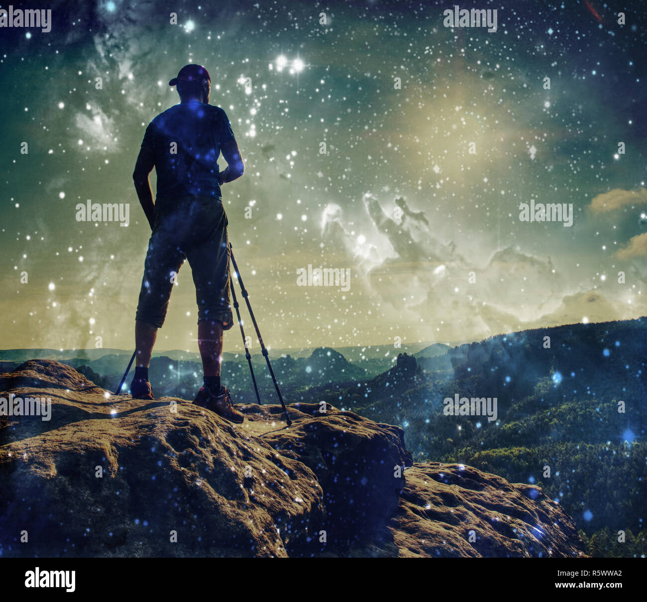 Abstract, over filtered. Man walking on the edge of sharp cliff high ...