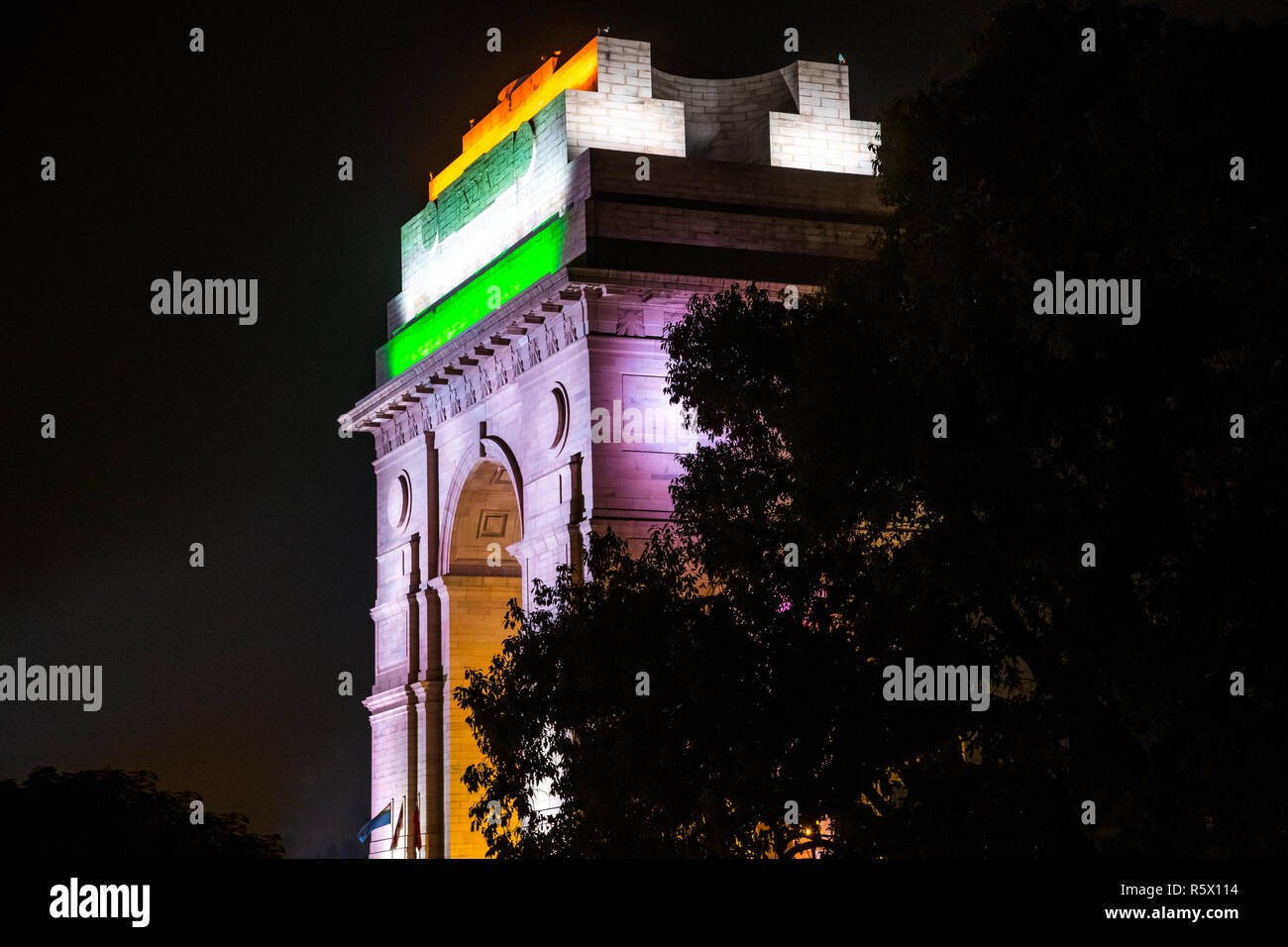 A night view of illuminated India Gate with the Indian flag lighted on it Stock Photo