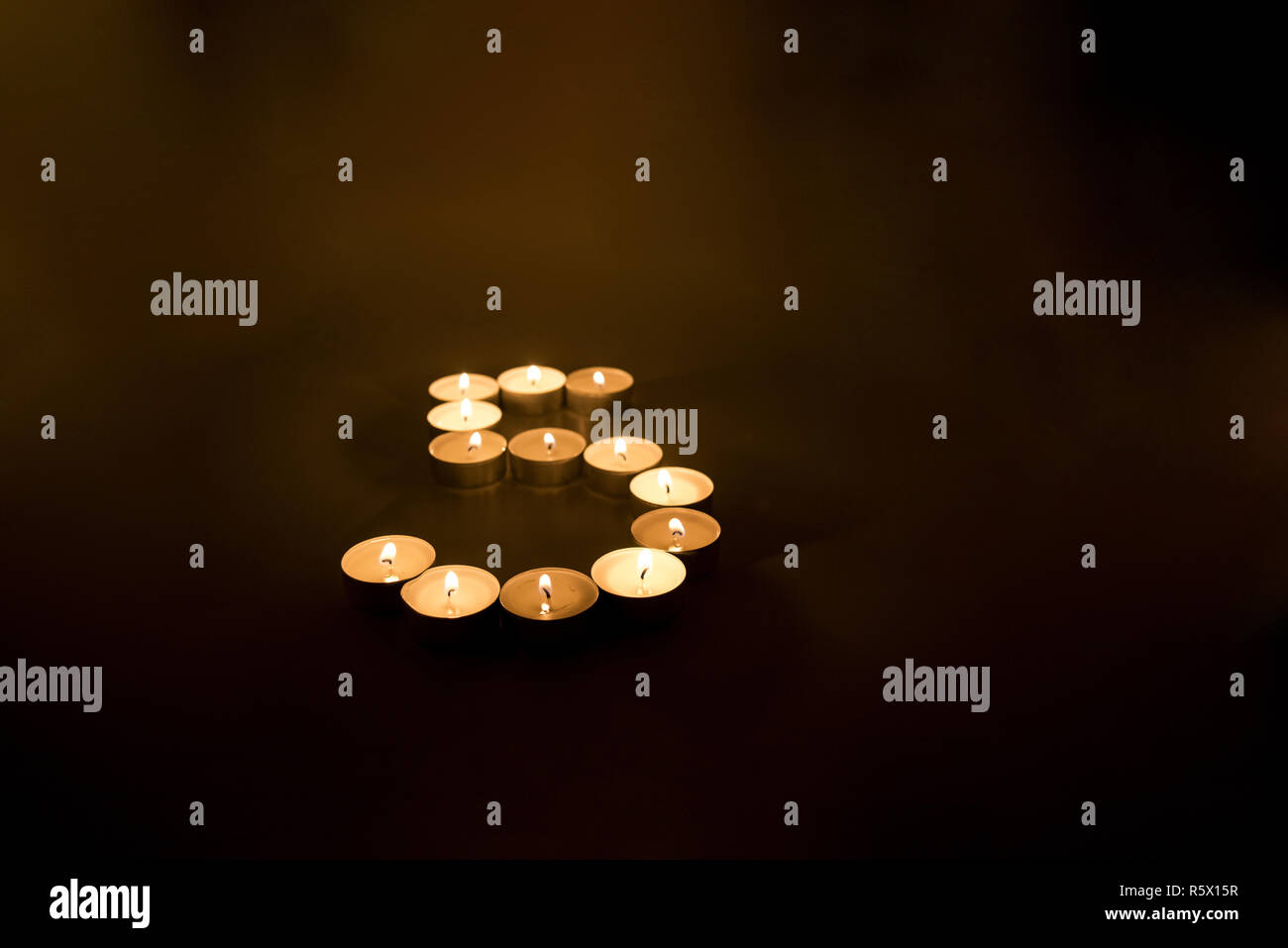 Rustic Candle Numbers Numbers made from candles on black background Stock Photo - Alamy