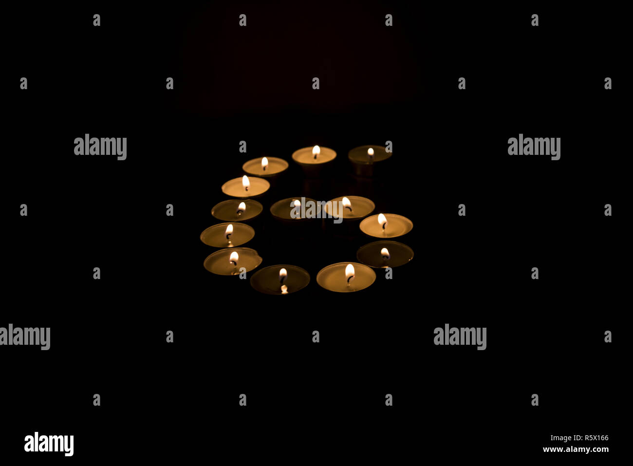 Rustic Candle Numbers Numbers made from candles on black background Stock Photo - Alamy