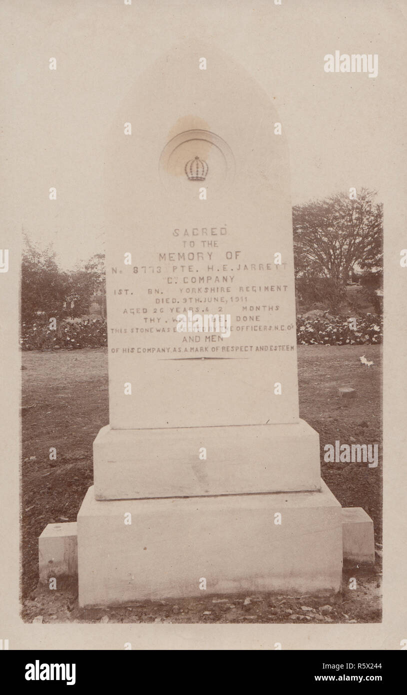 Vintage Photographic Postcard of a British Military Memorial. Sacred To The Memory of No.8773 Private H.E.Jarrett, 'C' Company of the 1st Battalion of The Yorkshire Regiment. Died 9th June 1911 Aged 26 Years & 2 Months. Stock Photo