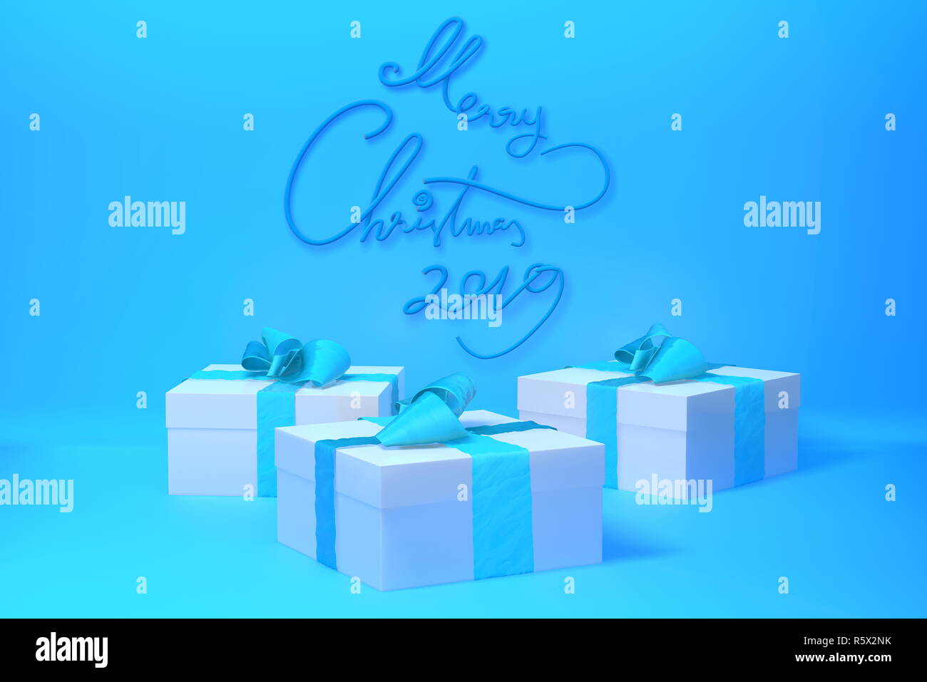 Merry Christmas 2019 lettering written on blue color wall and three present gift boxes with bows beside. 3d illustration Stock Photo