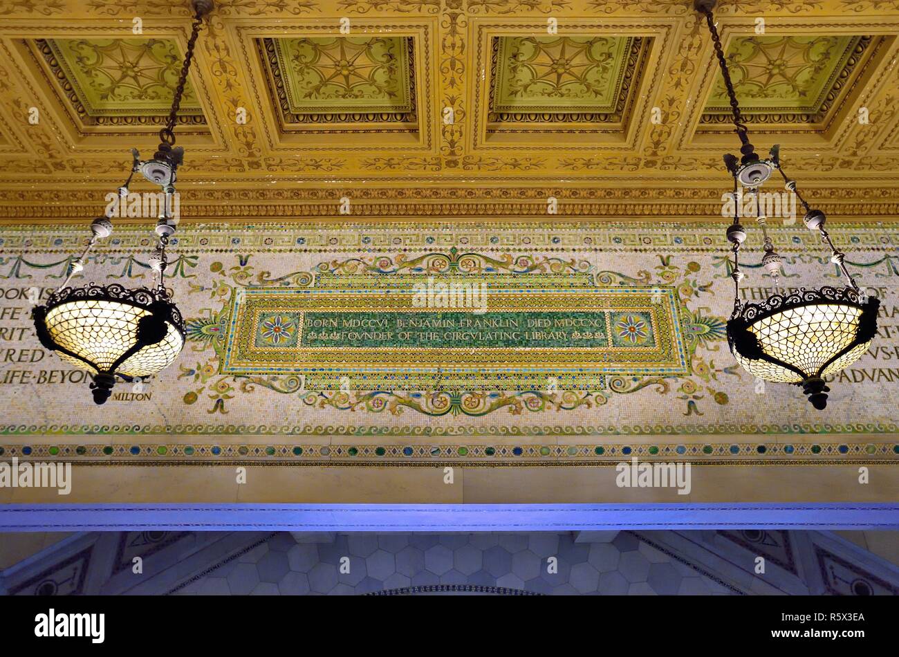 Chicago, Illinois, USA. Detailed, inlaid tile illuminated by glass chandeliers in the Cultural Center. Stock Photo