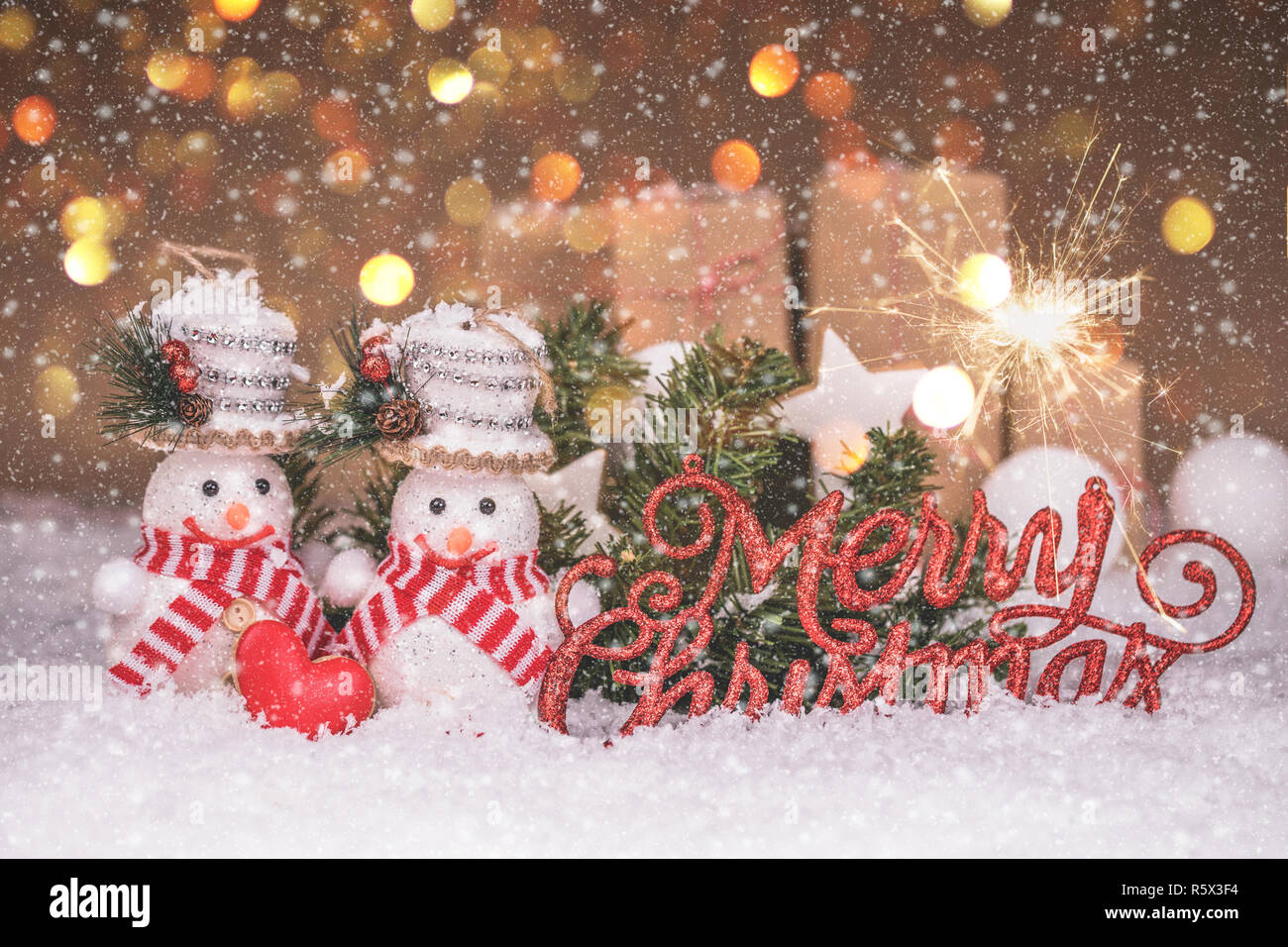 Snowman Couple With Red Heart Christmas Decorations And Snow Merry Christmas And Happy New Year Stock Photo Alamy