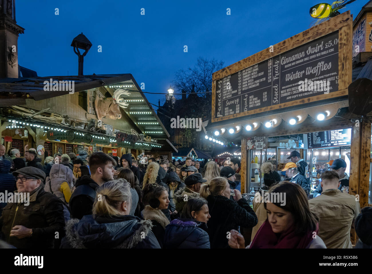 02 December 2018, Manchester Christmas Market. Zum Lustigen Rudolph ) bar and a Pancake Waffle Bar selling food and dring to festive shoppers. Stock Photo
