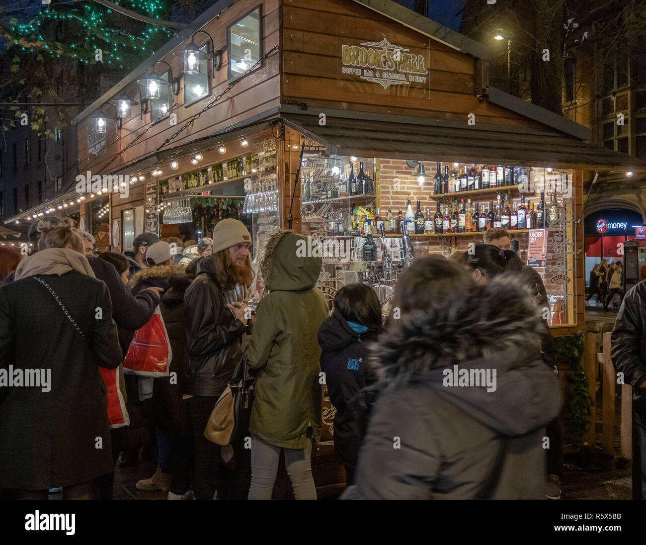 02 December 2018, Manchester Christmas Market.  Brooke's Mill Coffee Bar & Seasonal Winery in Albert Square. Customers enjoy a festive drink at the en Stock Photo