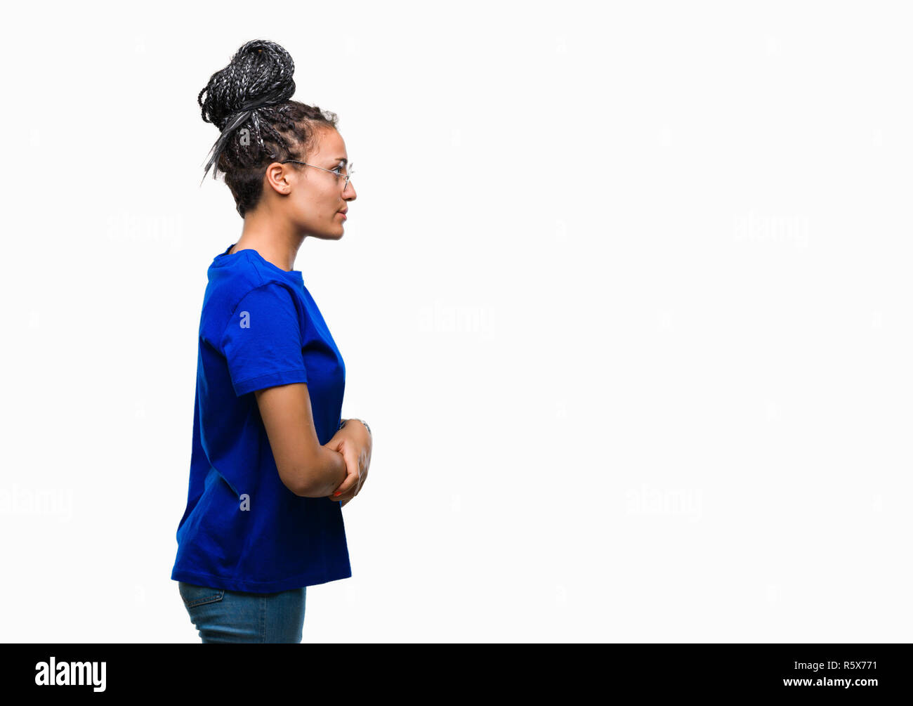 Young braided hair african american girl wearing glasses over isolated ...