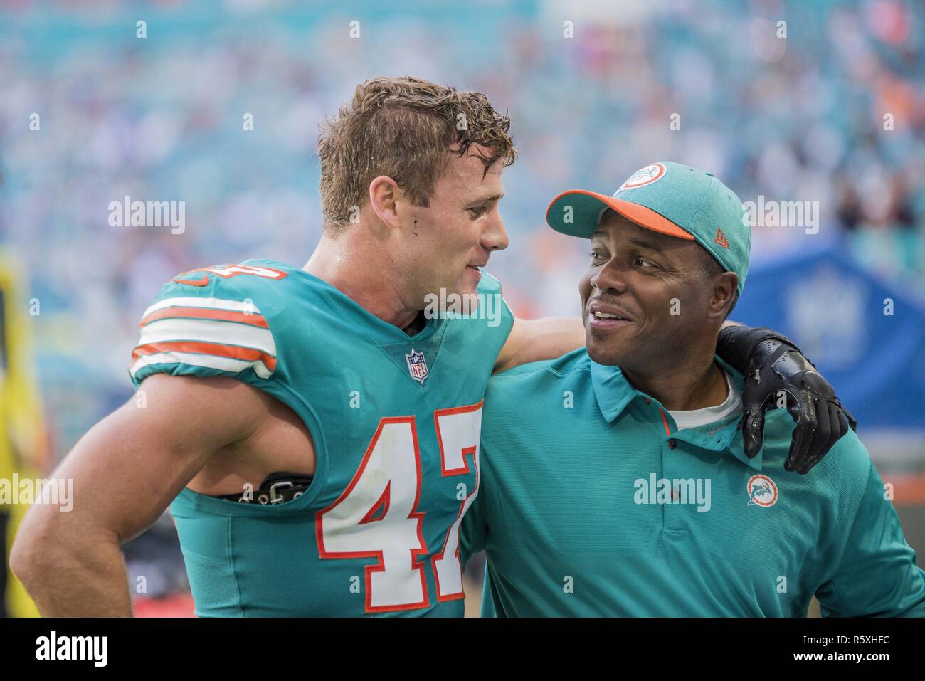 Miami, Florida, USA. 2nd Dec, 2018. 47 Kiko Alonso elebrating a victory with coach Tony Oden during the Miami Dolphins v Buffalo Bills on December 2, 2018 Credit: Dalton Hamm/ZUMA Wire/Alamy Live News Stock Photo