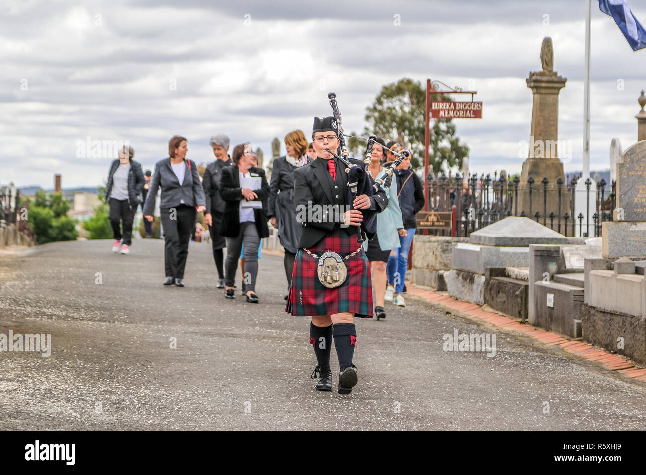 Old Ballarat Cemetery, Ballarat, Victoria, Australia. 3rd Dec 2018. The march to the Eureka diggers grave sites led the piper Amber Ives. Credit: brett keating/Alamy Live News Stock Photo