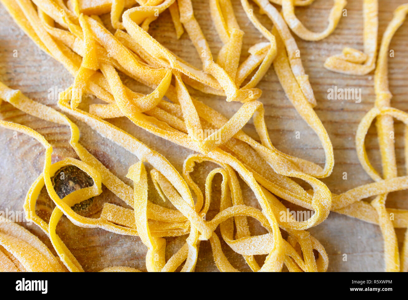 (selective focus) Fresh pasta called 'Fettuccine' made from fresh eggs