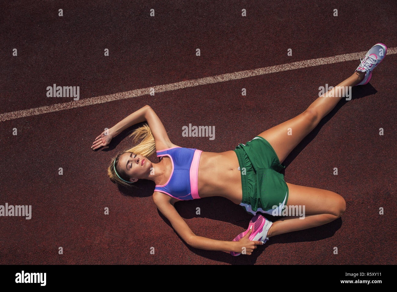 Warmingup after exercises and running Stock Photo Alamy