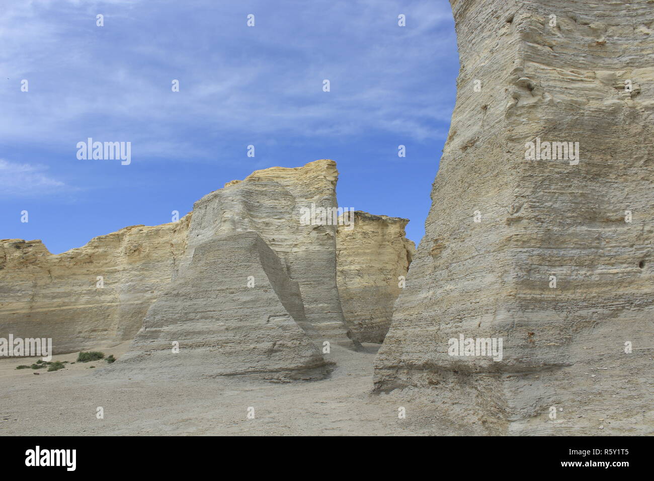 Monument Rock in Western Kansas with blue sky and clouds. Stock Photo
