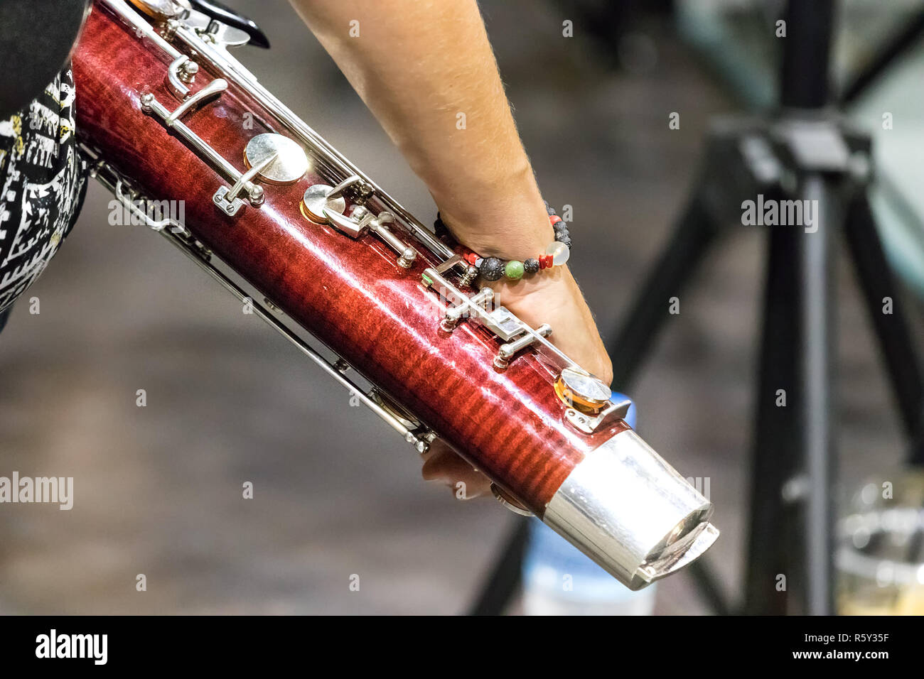 The boot joint or double joint of a blassoon and the hand pf a female