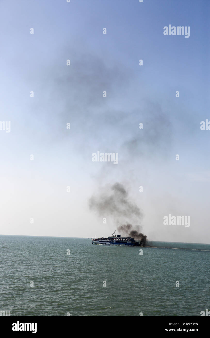 A catamaran vessel takes tourists from Teknaf to St Martin's Island,  belching black smoke on the way. Cox's Bazar, Bangladesh Stock Photo - Alamy