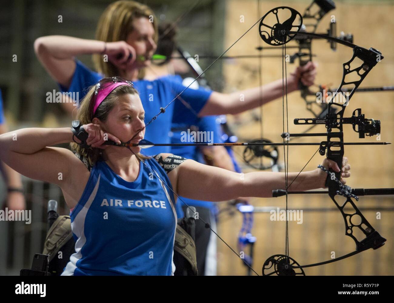 Ashley Crites and Melinda Smith, Warrior Games athletes, take aim at