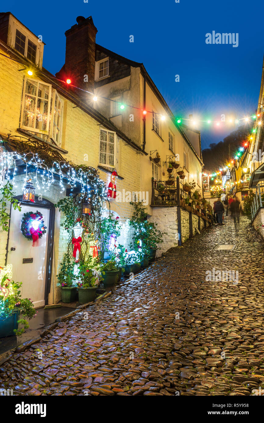 The cobbled streets and quaint harbour in the picturesque North Devon village of Clovelley was a stunning backdrop for a festive light celebration on  Stock Photo