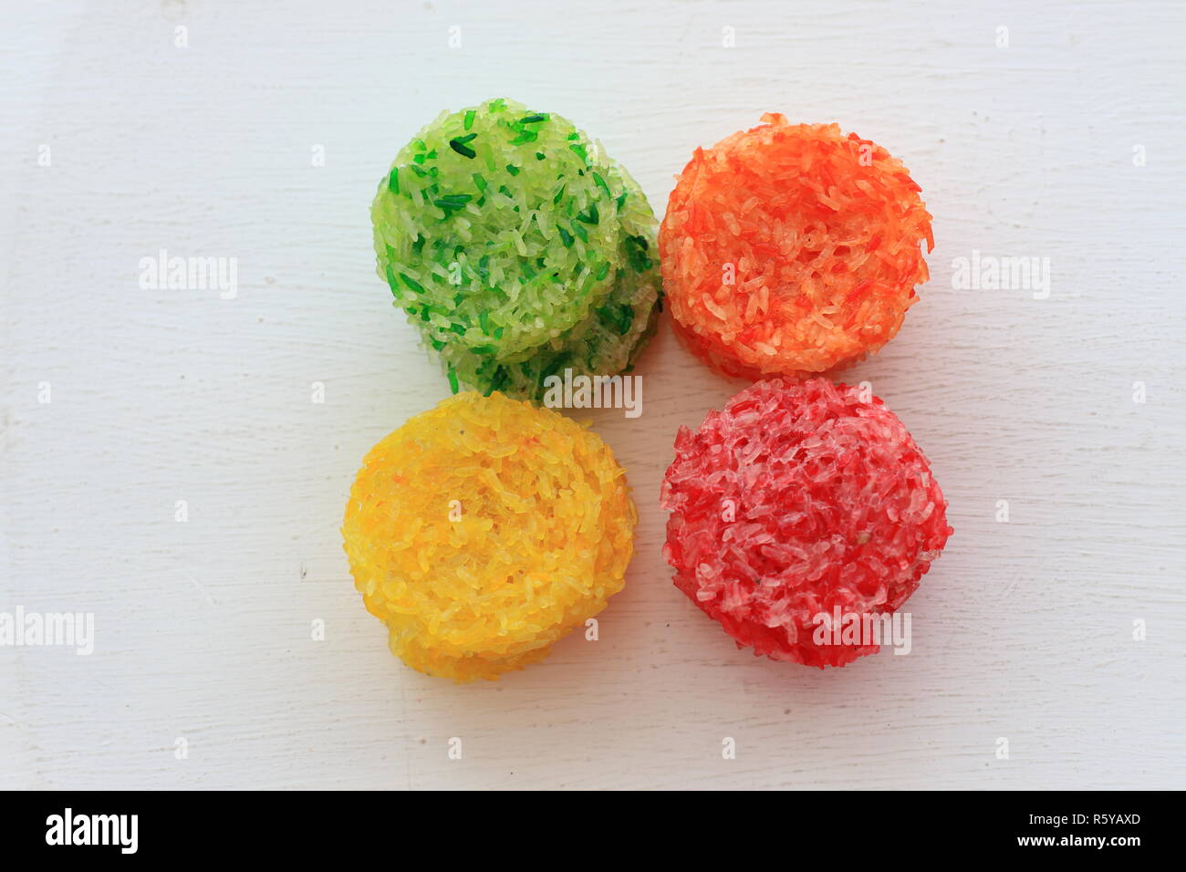 Inang-inang, sun dried multi color glutinous rice crackers isolated against white background Stock Photo